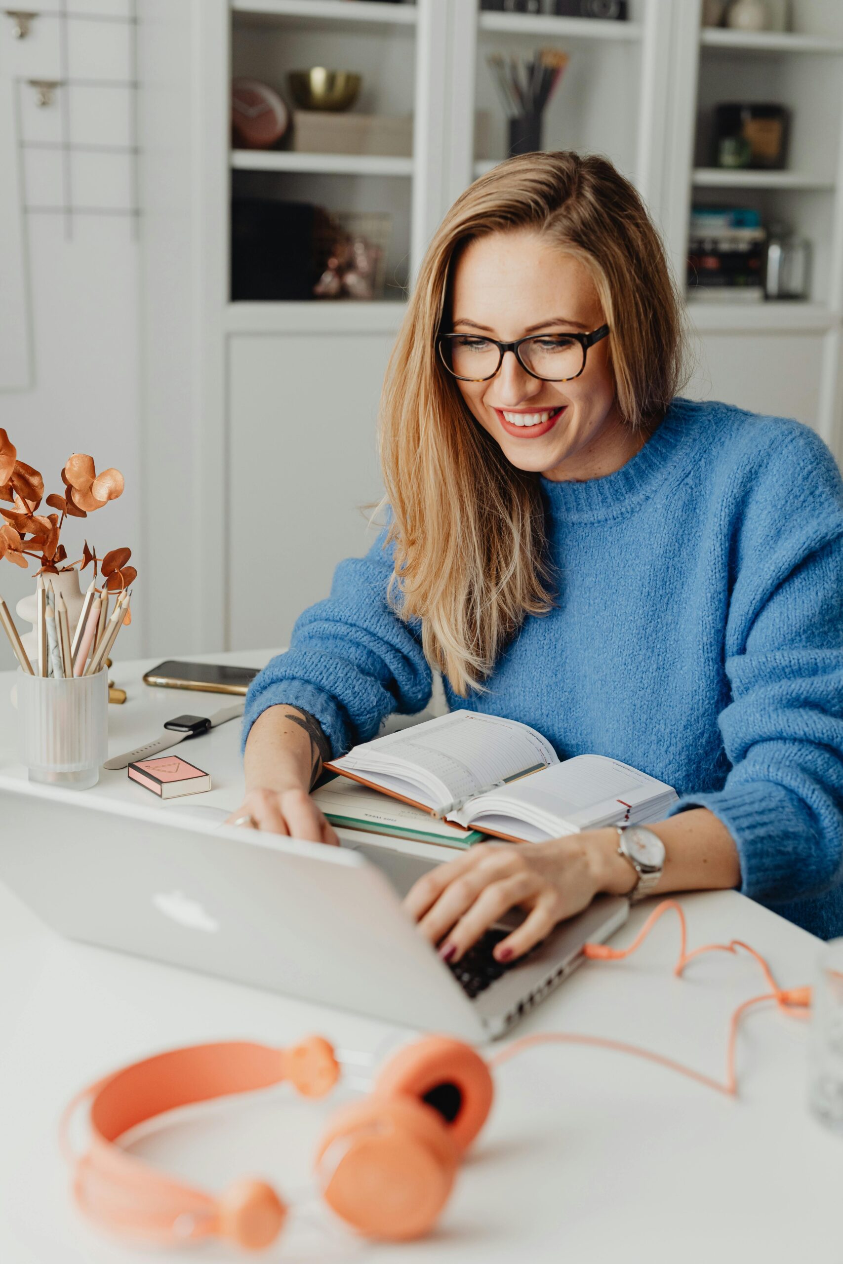 woman studying bible at laptop